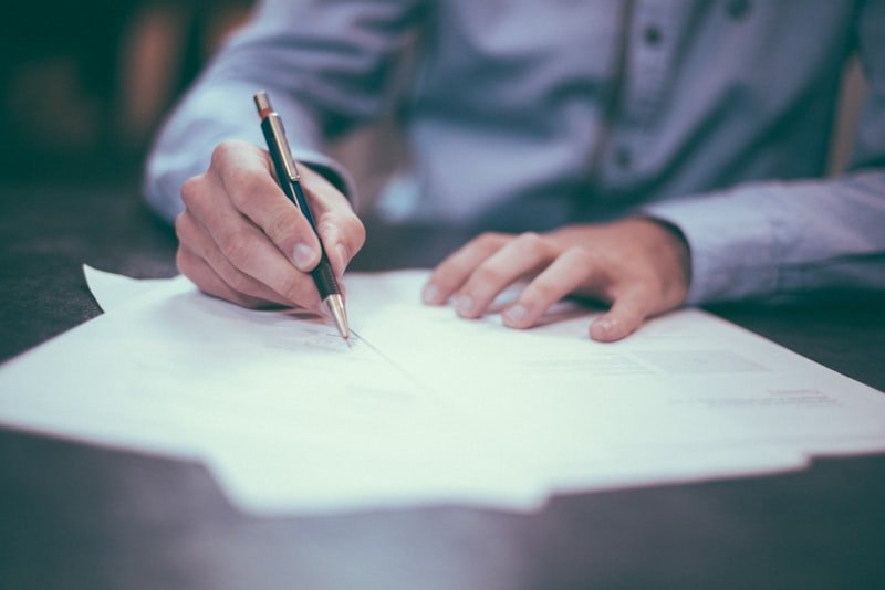 Business license documents on desk